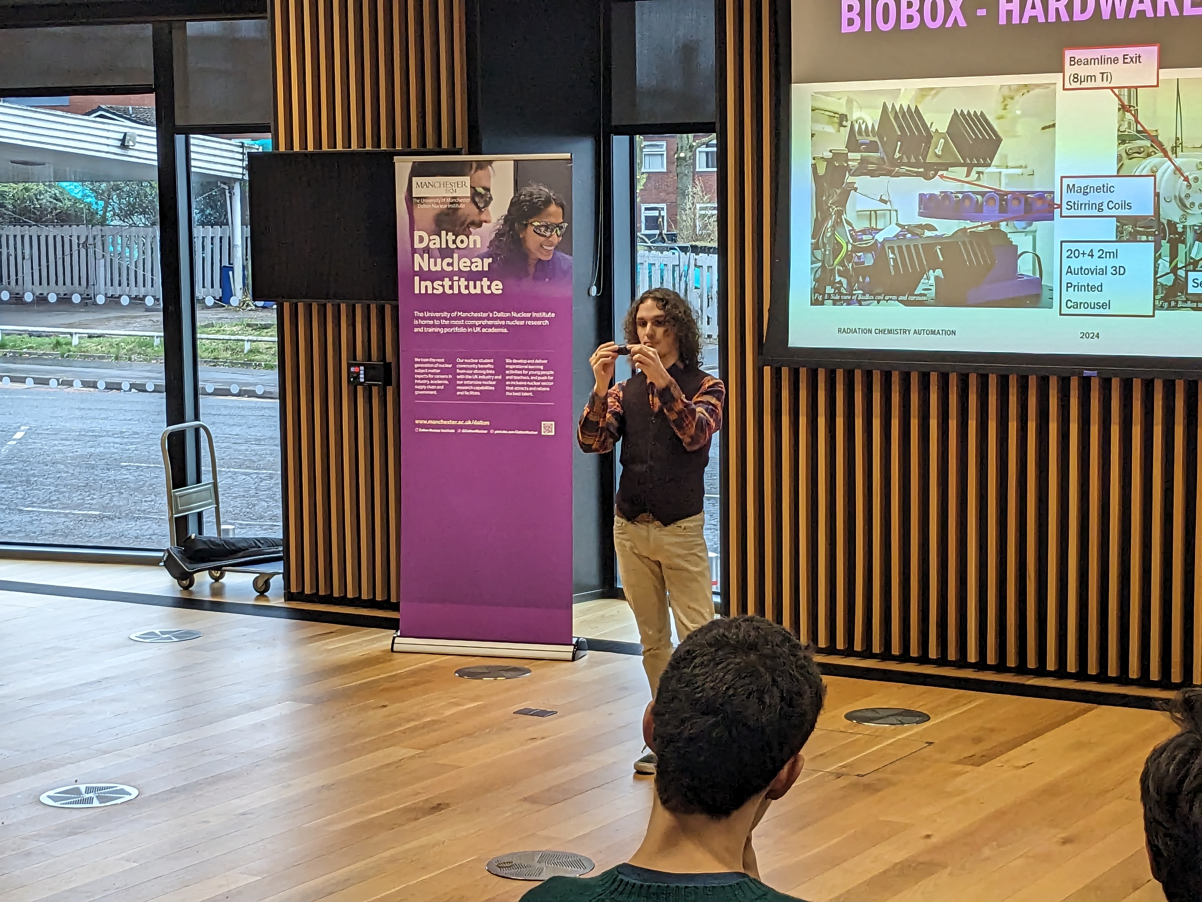 A picture of myself presenting at the physics undergraduate conference.